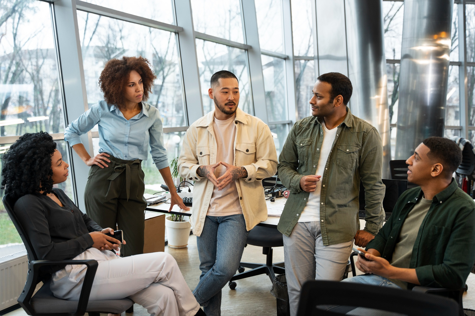 A group of employees having a conversation.